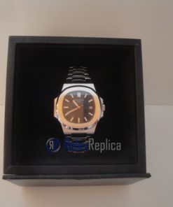 Alternative view of patek philippe replica nautilus blue dial skeletron acciaio orologio imitazione